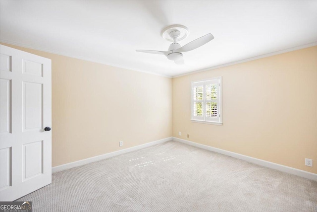 4802 Wesleyan Woods Dr, Macon, GA 31210 - empty room with crown molding, baseboards, ceiling fan, and light carpet