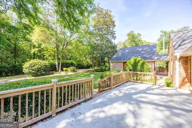 4802 Wesleyan Woods Dr, Macon, GA 31210 - wooden deck with a yard