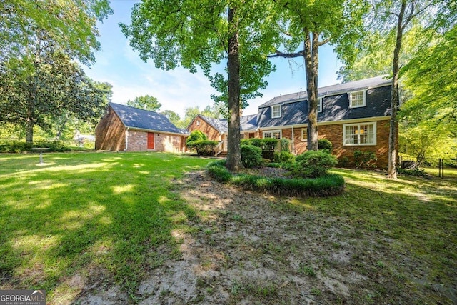 4802 Wesleyan Woods Dr, Macon, GA 31210 - view of yard featuring fence and an outdoor structure