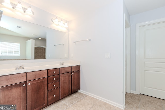 674 Chadmon Court Trce, Dacula, GA 30019 - bathroom with double vanity and tile patterned flooring