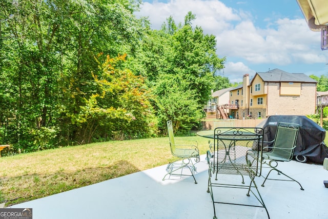 674 Chadmon Court Trce, Dacula, GA 30019 - view of patio featuring a grill and outdoor dining area