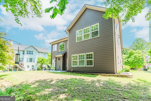 674 Chadmon Court Trce, Dacula, GA 30019 - rear view of property with a yard