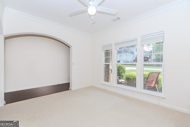 674 Chadmon Court Trce, Dacula, GA 30019 - carpeted spare room featuring ornamental molding, arched walkways, and a ceiling fan
