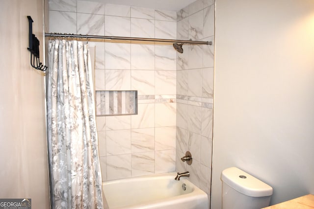 full bath with toilet and shower / tub combo with curtain