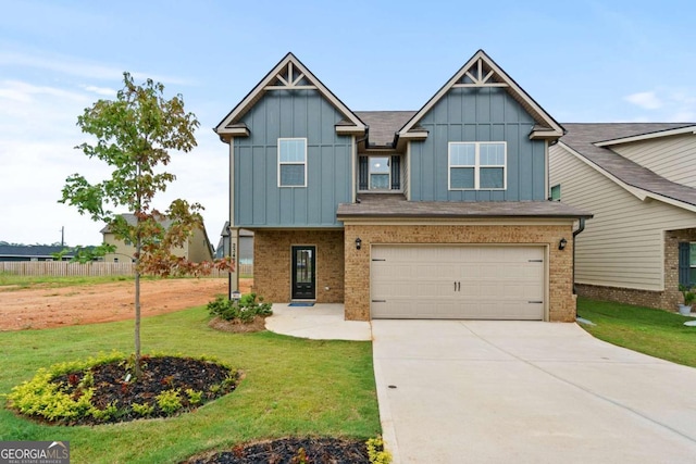 craftsman house with board and batten siding, a front lawn, and brick siding