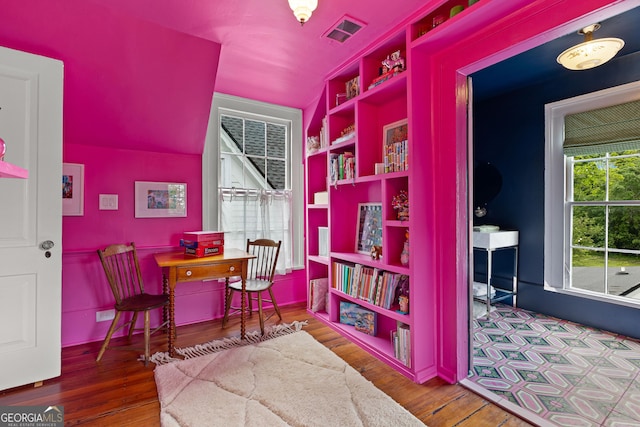 recreation room with visible vents and wood finished floors