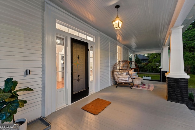 entrance to property with covered porch