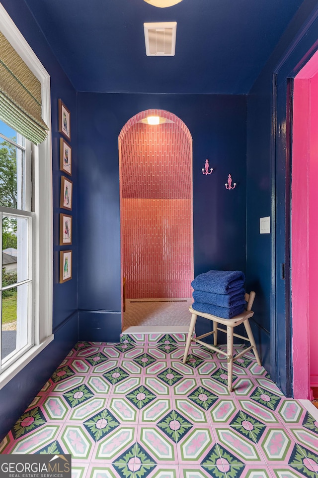 interior space featuring visible vents and carpet