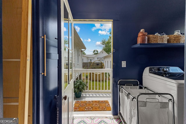 washroom featuring laundry area and washer / clothes dryer