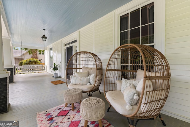 wooden deck featuring a porch