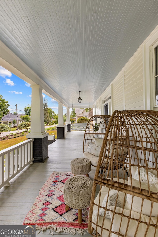 wooden terrace with covered porch