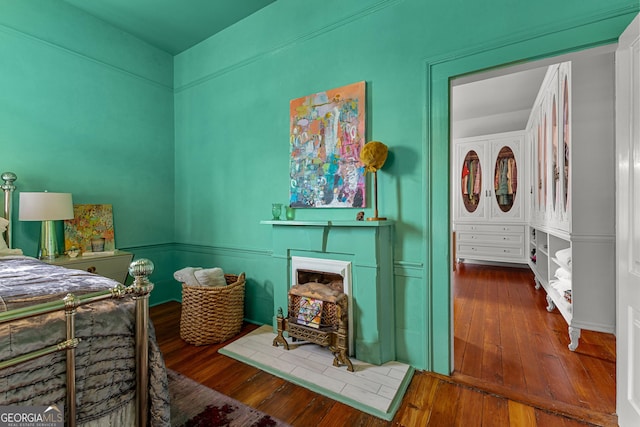 bedroom featuring hardwood / wood-style floors