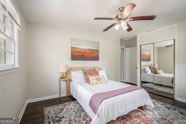 2623 Riggs Dr, Atlanta, GA 30344 - bedroom featuring baseboards, a ceiling fan, a closet, and wood finished floors