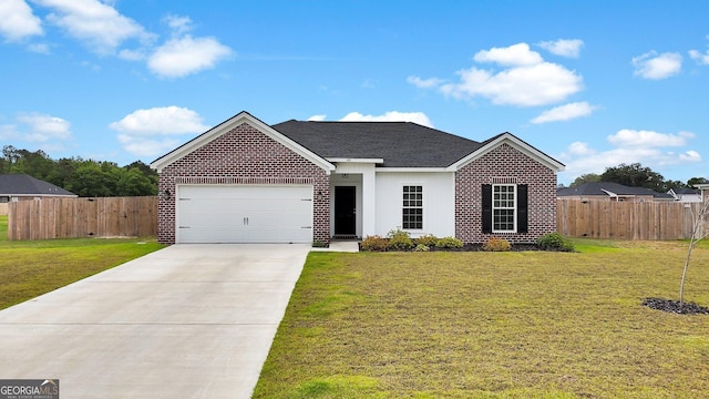 481 Akins Ranch Rd NE, Ludowici, GA 31316 - ranch-style house with a garage, fence, a front yard, and concrete driveway
