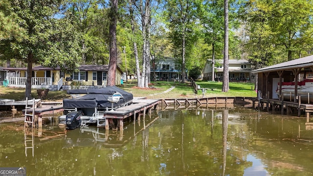 175 Mayo Rd, Covington, GA 30014 - dock area featuring a lawn, boat lift, and a water view