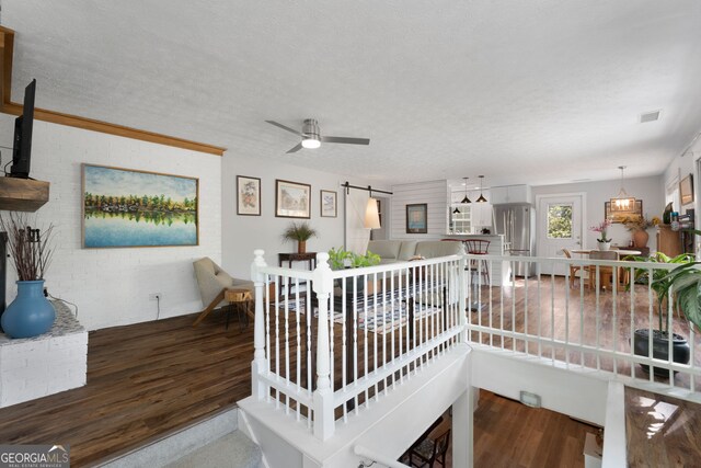 175 Mayo Rd, Covington, GA 30014 - interior space featuring visible vents, a textured ceiling, ceiling fan, and wood finished floors