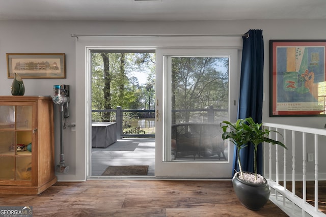 175 Mayo Rd, Covington, GA 30014 - doorway to outside featuring wood finished floors