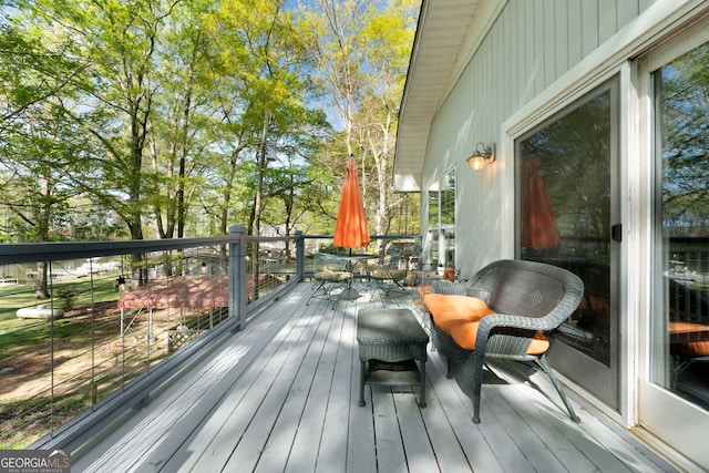 175 Mayo Rd, Covington, GA 30014 - wooden deck featuring outdoor dining space