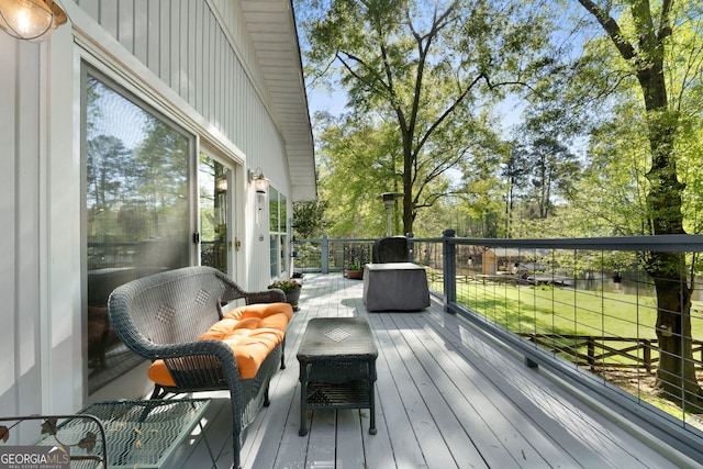 175 Mayo Rd, Covington, GA 30014 - wooden deck with a lawn