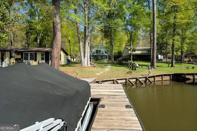 175 Mayo Rd, Covington, GA 30014 - view of dock featuring a water view and a yard