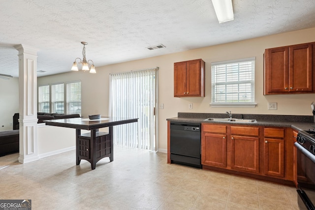 kitchen with ornate columns, a sink, black appliances, and visible vents