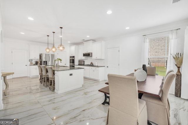 dining area with recessed lighting and marble finish floor