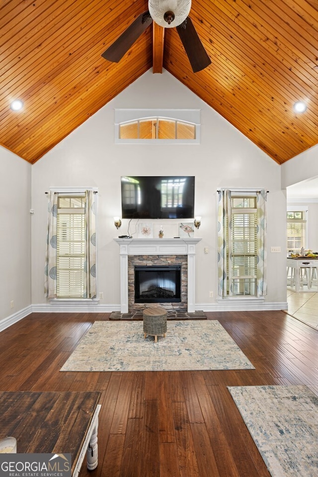 4577 San Saba Dr, Hahira, GA 31632 - living room with wood-type flooring, a ceiling fan, high vaulted ceiling, and a fireplace