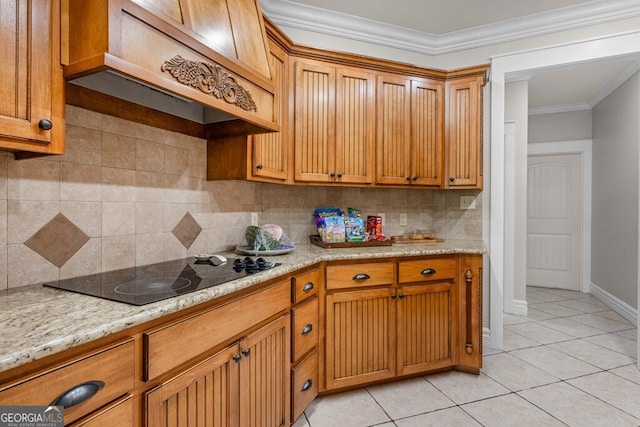 4577 San Saba Dr, Hahira, GA 31632 - kitchen with crown molding, light tile patterned floors, black electric stovetop, and tasteful backsplash