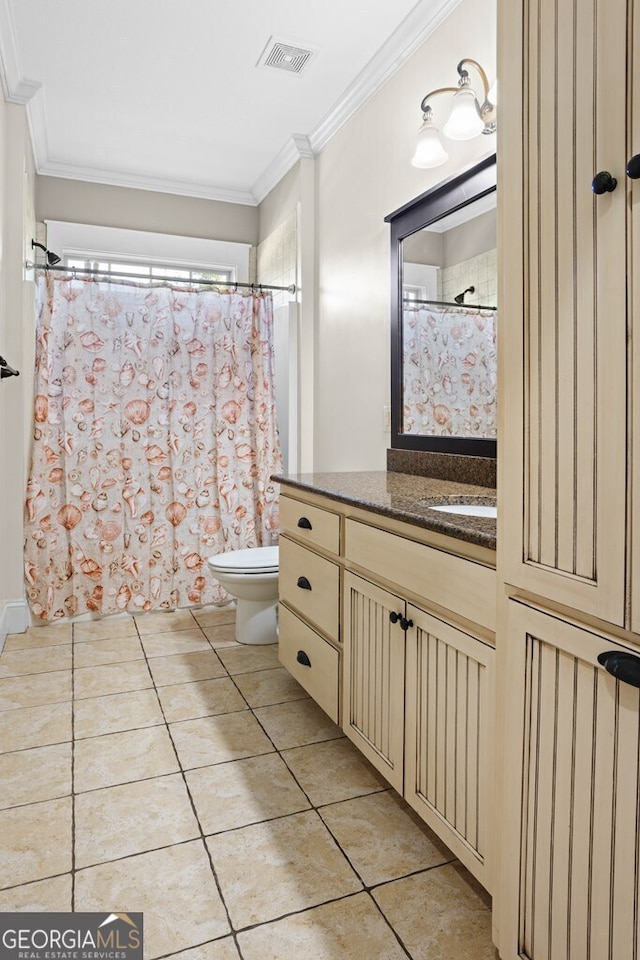 4577 San Saba Dr, Hahira, GA 31632 - bathroom with tile patterned flooring, crown molding, visible vents, vanity, and toilet
