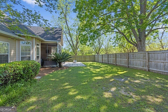 4577 San Saba Dr, Hahira, GA 31632 - view of yard with a fenced backyard, a sunroom, and a patio area