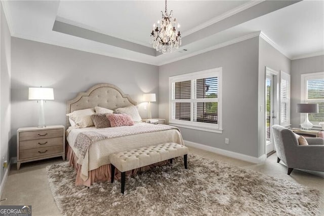 3592 Parkhaven Pl, Brookhaven, GA 30319 - carpeted bedroom featuring baseboards, a chandelier, ornamental molding, and a tray ceiling