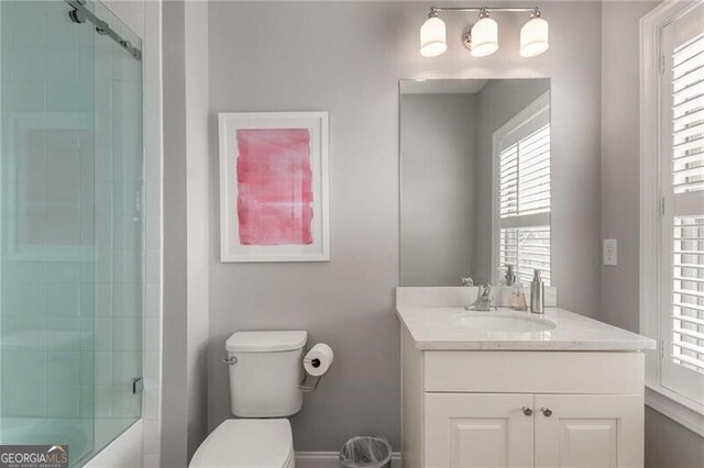 3592 Parkhaven Pl, Brookhaven, GA 30319 - full bathroom with vanity, a wealth of natural light, and toilet