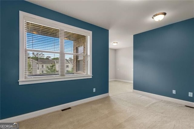 3592 Parkhaven Pl, Brookhaven, GA 30319 - empty room featuring carpet flooring, baseboards, and visible vents