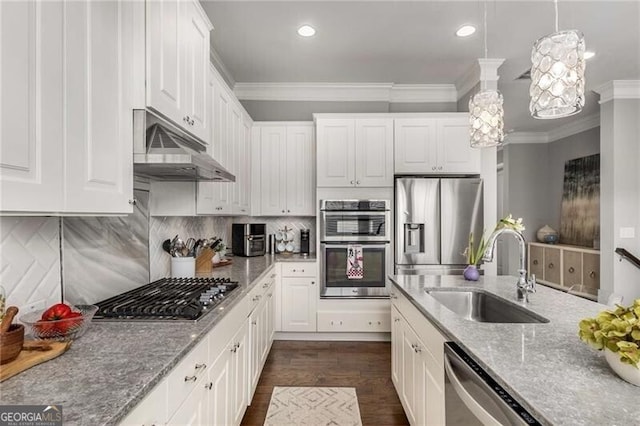 3592 Parkhaven Pl, Brookhaven, GA 30319 - kitchen with a sink, appliances with stainless steel finishes, crown molding, and under cabinet range hood