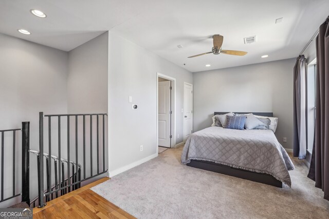 bedroom featuring visible vents, carpet floors, baseboards, recessed lighting, and a ceiling fan