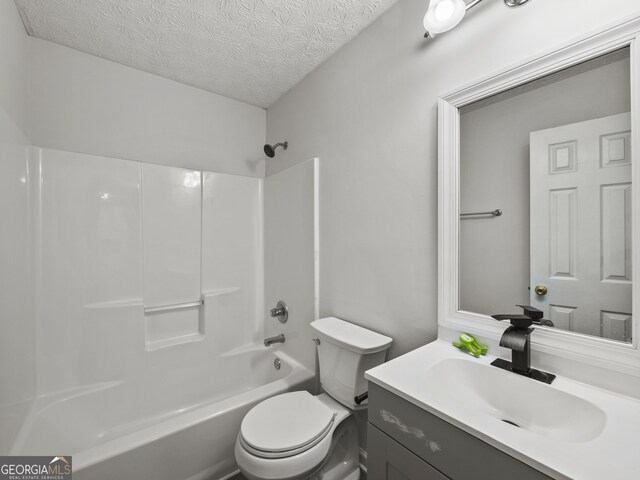 205 Crooked Pine Trl, Baldwin, GA 30511 - full bathroom featuring vanity, shower / bathtub combination, toilet, and a textured ceiling