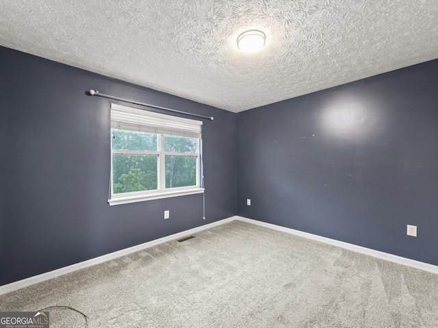 205 Crooked Pine Trl, Baldwin, GA 30511 - carpeted spare room with a textured ceiling, visible vents, and baseboards