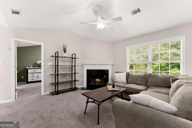 1628 Brook Ln, Monroe, GA 30655 - living room with ceiling fan, carpet, a fireplace with flush hearth, and lofted ceiling
