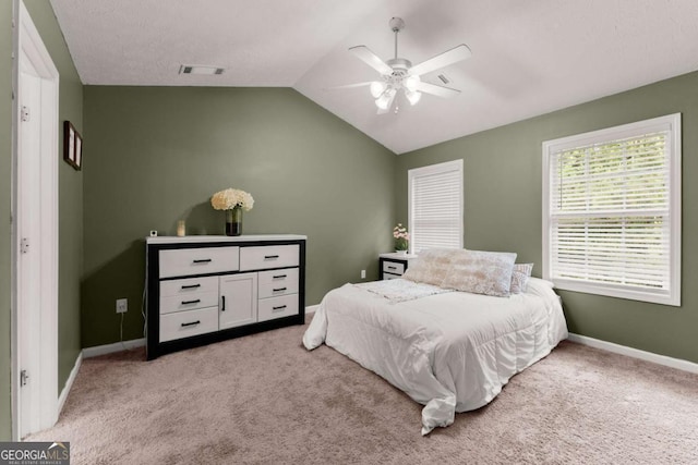 1628 Brook Ln, Monroe, GA 30655 - bedroom featuring light carpet, lofted ceiling, and ceiling fan