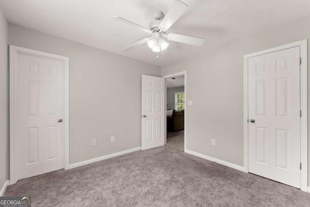 1628 Brook Ln, Monroe, GA 30655 - unfurnished bedroom with carpet floors and a ceiling fan