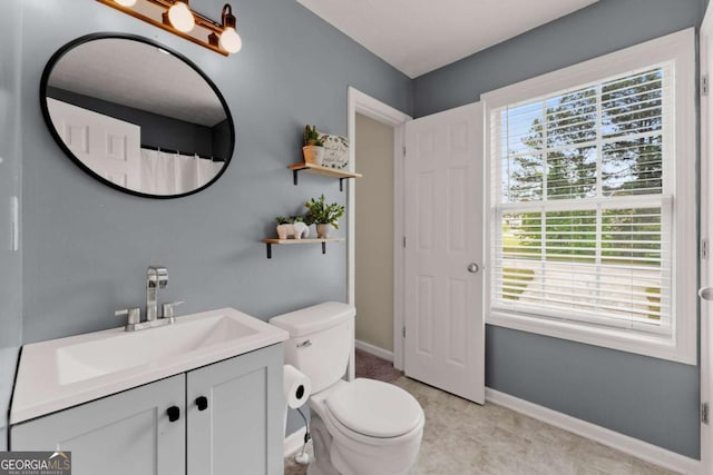 1628 Brook Ln, Monroe, GA 30655 - bathroom with vanity and toilet