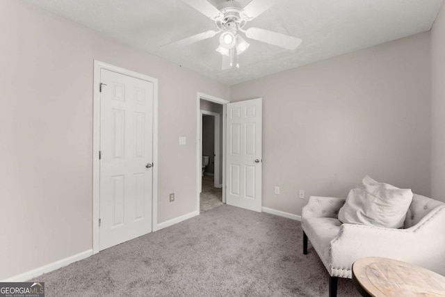 1628 Brook Ln, Monroe, GA 30655 - living area featuring carpet and a ceiling fan