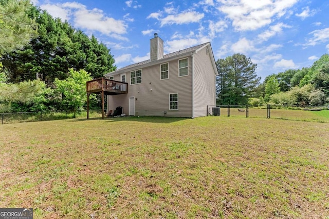 1628 Brook Ln, Monroe, GA 30655 - rear view of house featuring a chimney and a deck