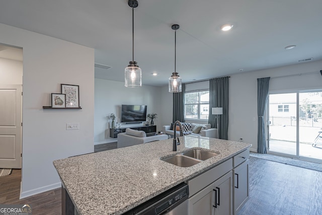 110 Cole St, Pooler, GA 31322 - kitchen with dark wood-style flooring, a sink, open floor plan, baseboards, and stainless steel dishwasher
