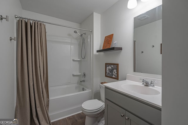 110 Cole St, Pooler, GA 31322 - bathroom featuring vanity, toilet, wood finished floors, and shower / tub combo with curtain