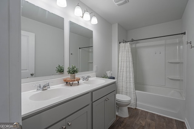 110 Cole St, Pooler, GA 31322 - full bathroom featuring toilet, visible vents, a sink, and wood finished floors