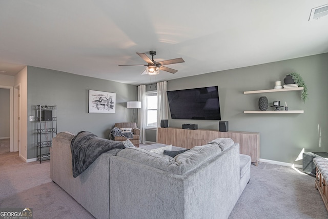 110 Cole St, Pooler, GA 31322 - living room featuring baseboards, visible vents, a ceiling fan, and light colored carpet