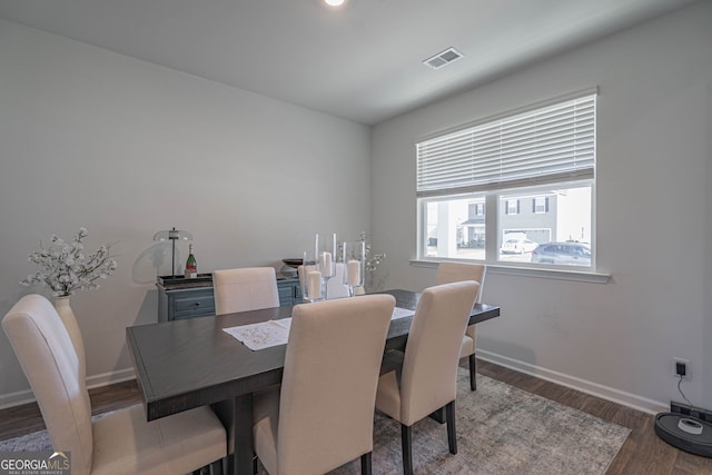 110 Cole St, Pooler, GA 31322 - dining room with baseboards, wood finished floors, and visible vents