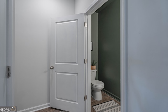 110 Cole St, Pooler, GA 31322 - bathroom featuring baseboards, toilet, and wood finished floors