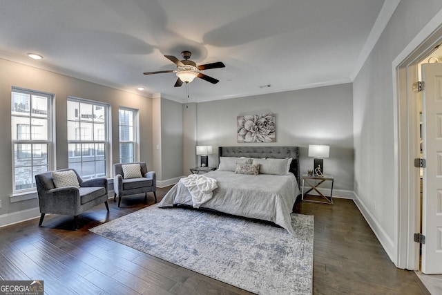 606 Broadview Ter NE, Atlanta, GA 30324 - bedroom with baseboards, crown molding, dark wood finished floors, and ceiling fan